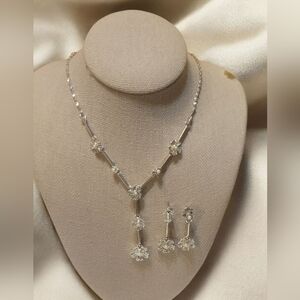 Silvertone floral Y necklace and earrings set by Nina Ricci Fashion Jewelry